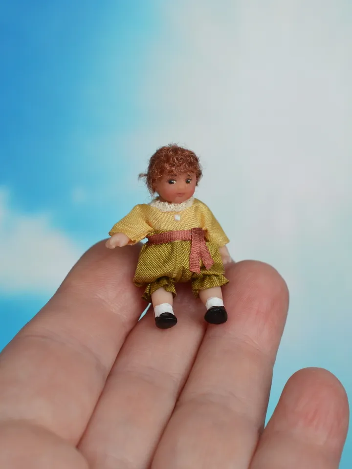 Miniature doll in 1/24 scale.  Doll toy to doll house.