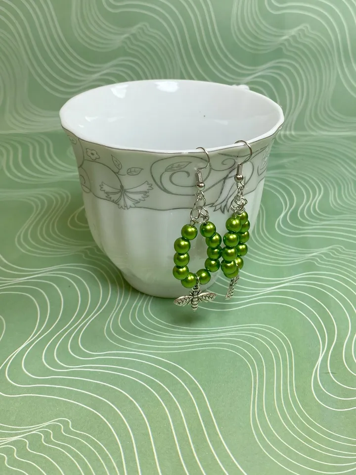 Earrings with green flies. Handmade jewelry.