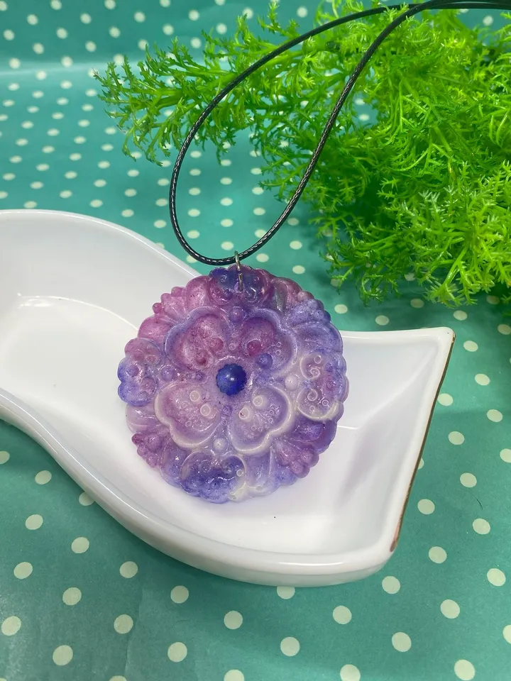 Pendant with cord. Handmade.
