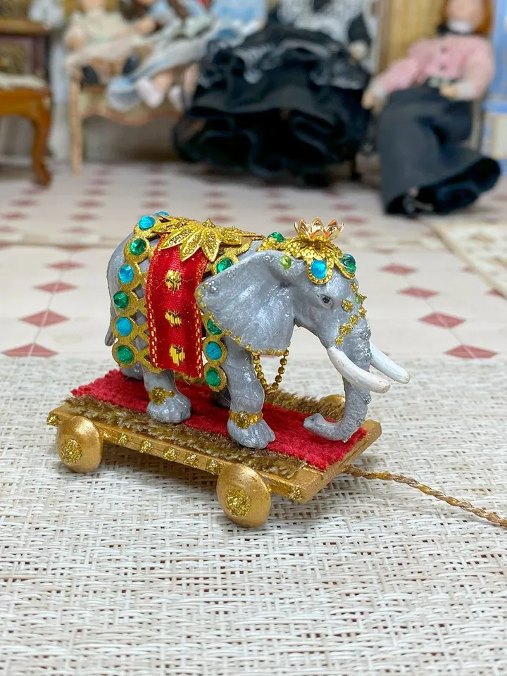 Elephant on a cart. Miniature. 1:12. Toy for a doll. Elephant. Animal for a doll.