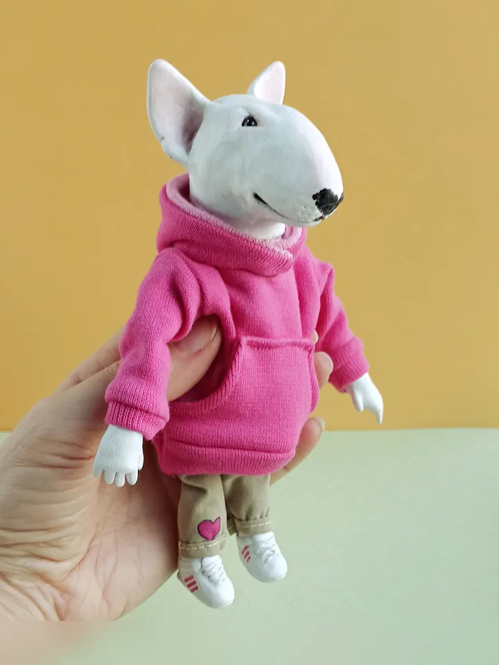 Bull Terrier doll in a pink sweater