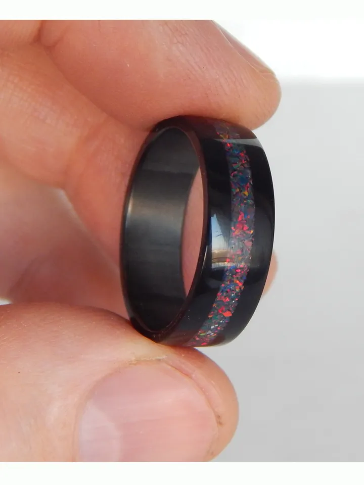 Stylish black ring. Carbon ring with synthetic opal. 10 1/2