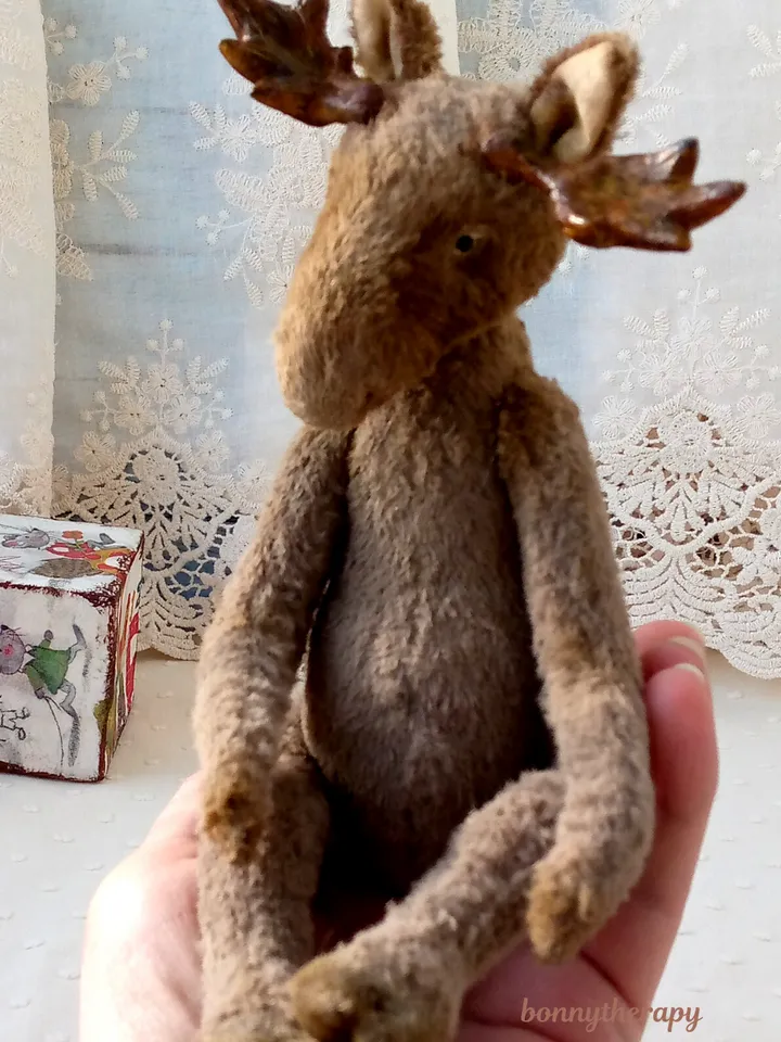 Teddy moose, cuddly plush elk in teddy style 6.6 inches sitting.