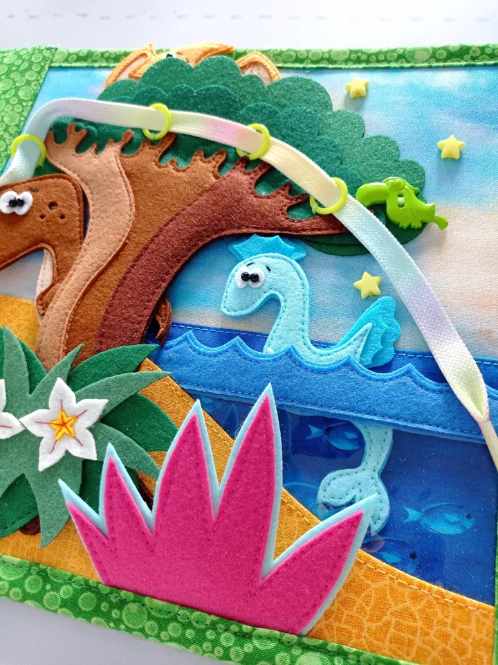 felt gaming tablet for children about the life history of different types of dinosaurs