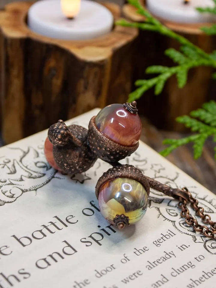 An original handmade electroformed copper pendant made from natural acorn caps in a single copy.