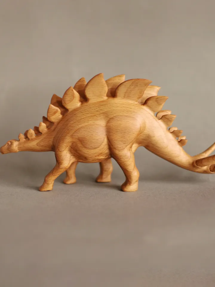 Wooden hand carved dinosaur stegosaurus