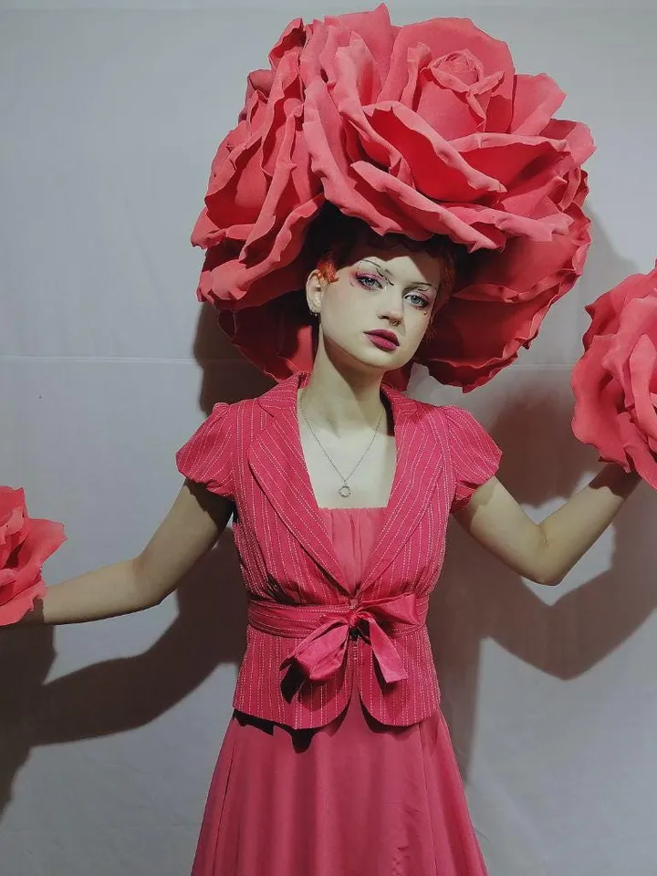 A set of headdress and roses on hands, roses on the head, a headdress from roses, a burning man, festival clothing, a suit for the show,set
