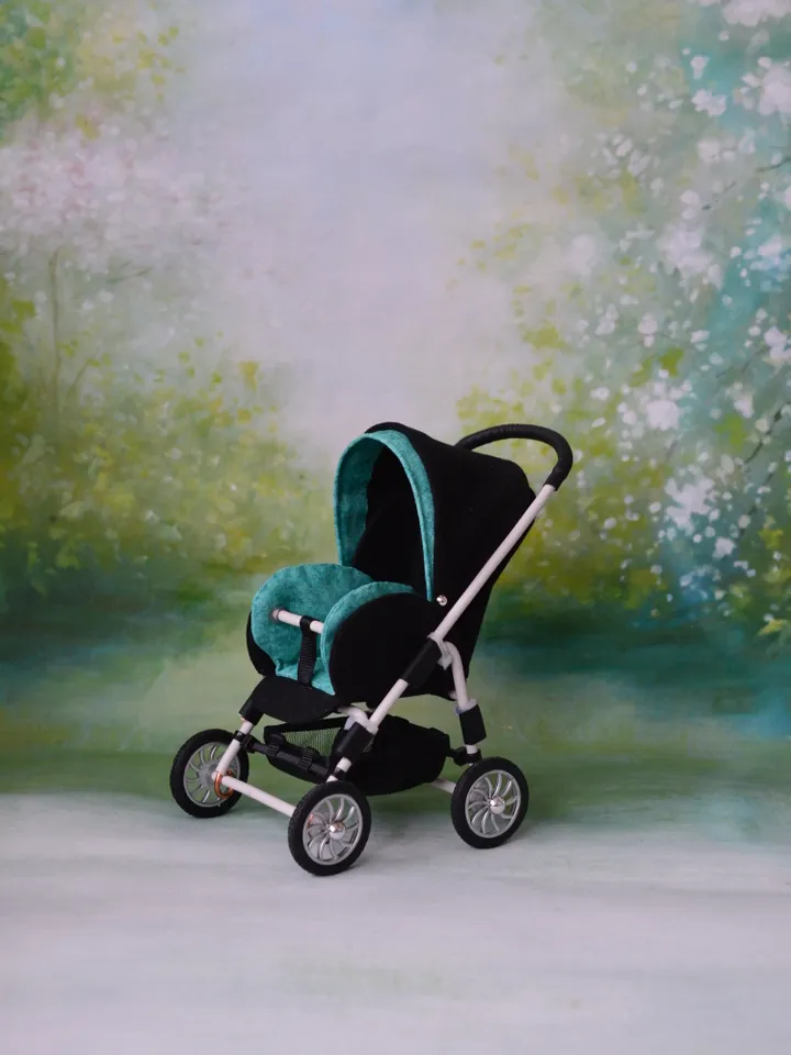 Miniature toy stroller for dolls in 1/6 scale. Accessories for small dolls and poupins. Pram for Barbie doll.