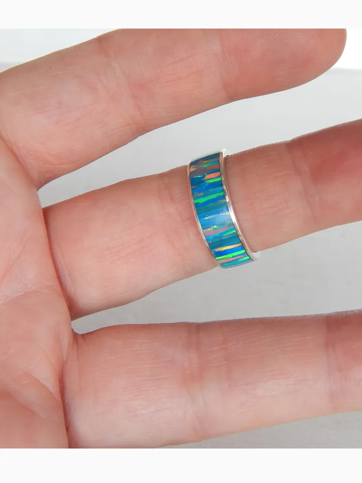 Silver ring with synthetic opal. Exclusive ring as a gift.