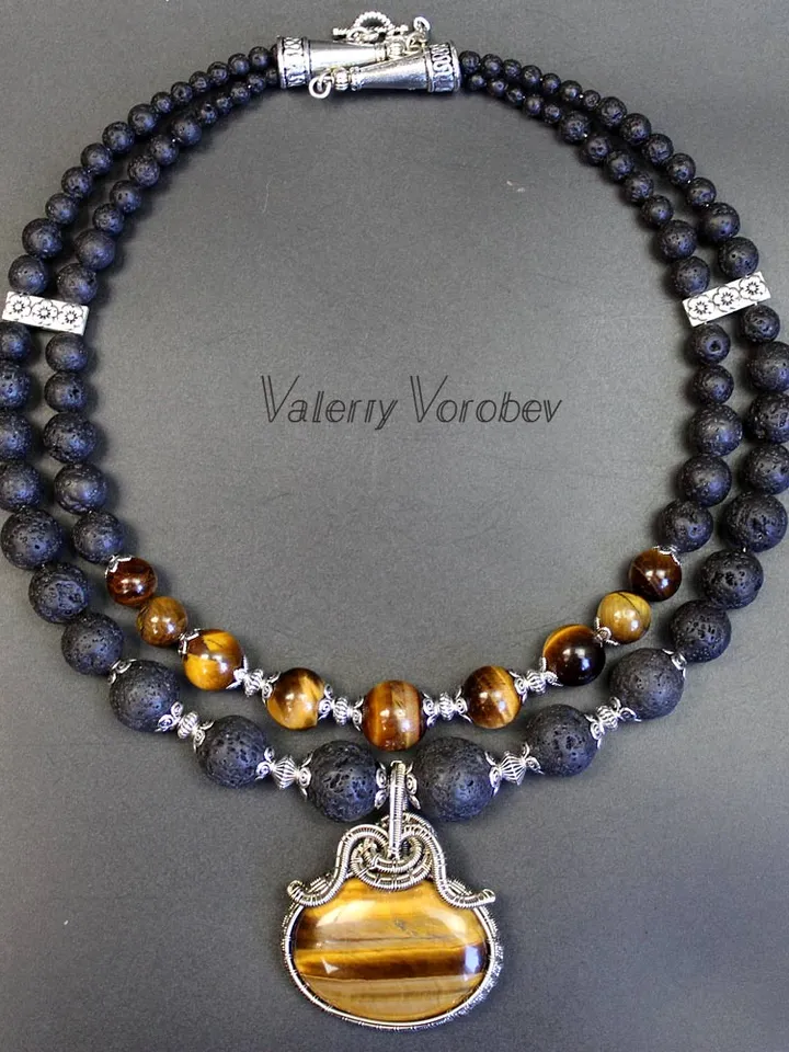 Necklace made of natural stones volcanic lava and tiger eye.