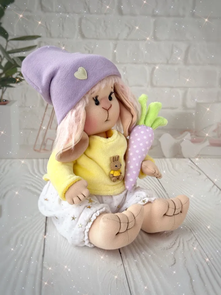 Lovey bunny toy. Handmade cute stuffed rabbit with clothes and carrot. Soft rag bunny doll for Easter gift.