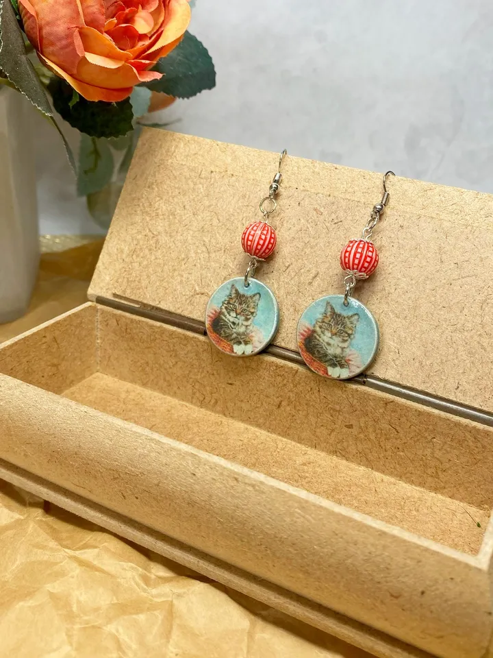 Handmade earrings. Earrings with beads. Handmade. Author's design. Earrings with images of cats.