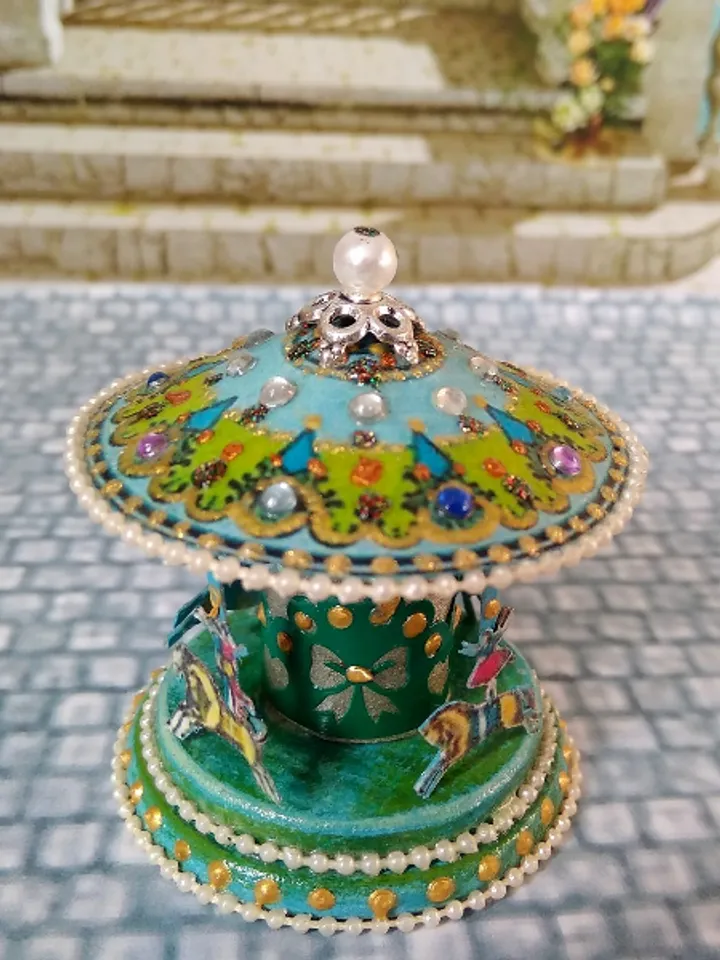 Miniature carousel. Dollhouse miniature.1:12 scale.