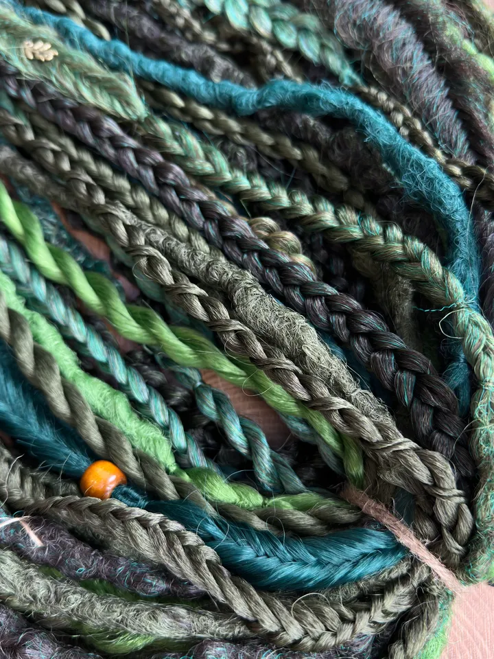 Dreads, green dreads and braids