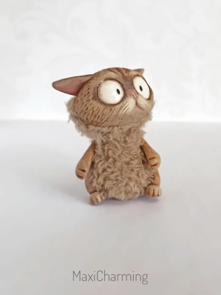 Discouraged cat doll