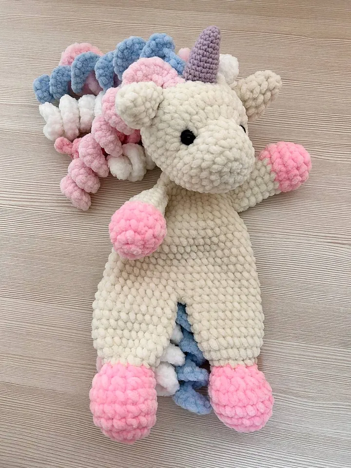 Crochet unicorn snuggler Handmade plushie toy for kids Unicorn cuddle stuffed toy