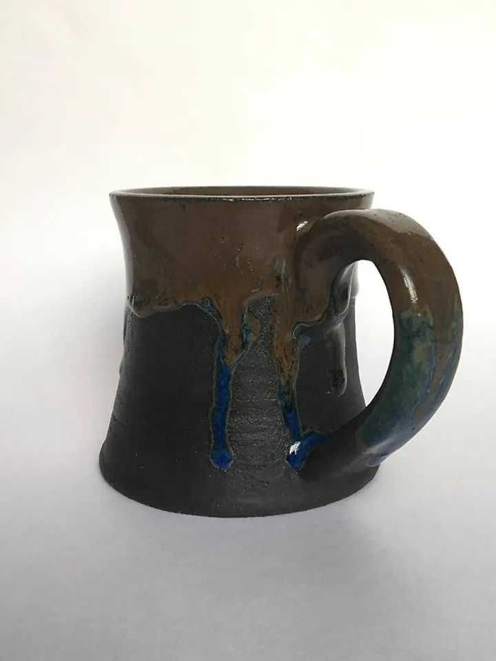 Brown, blue and black glazed stoneware mug