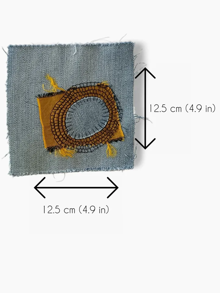 Upcycled denim boro patch. Sashiko stitching.