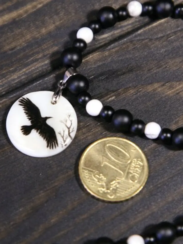 Raven or crow necklace with love rune on the other side. Nacre pearl pendant