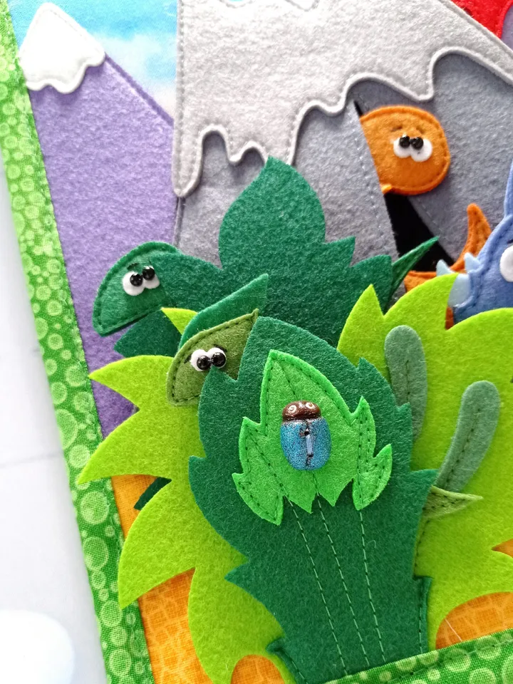 felt gaming tablet for children about the life history of different types of dinosaurs