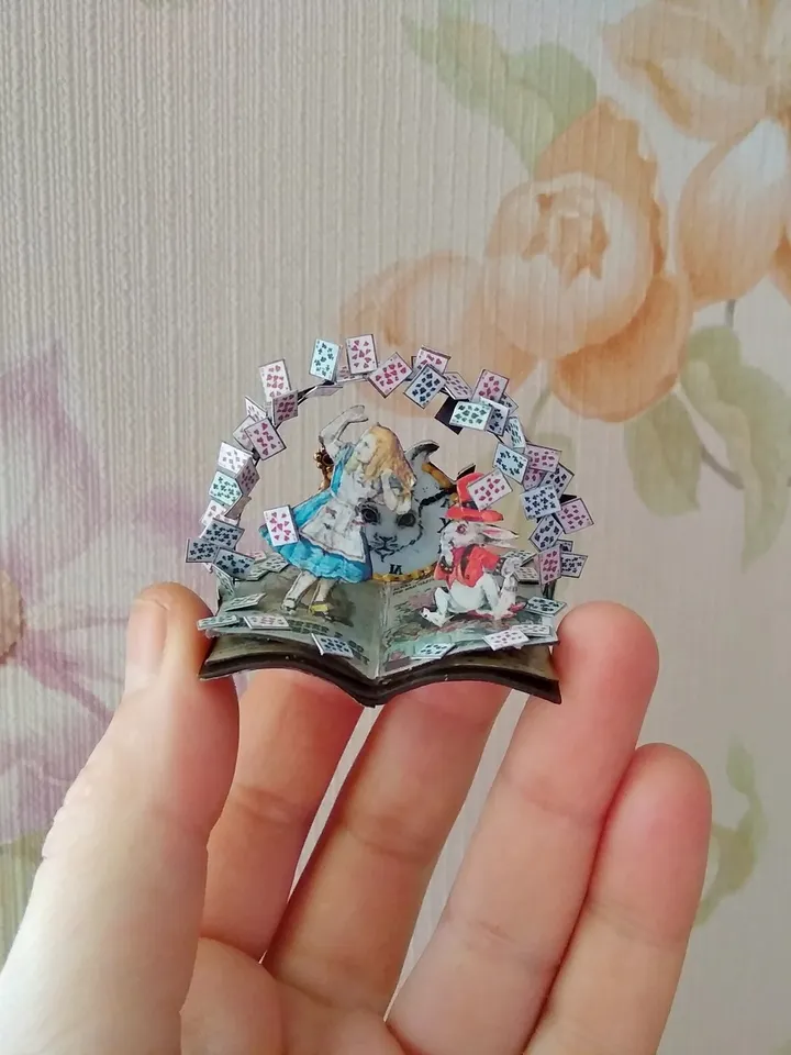 Open book. Dollhouse miniature.Miniature for a dollhouse.1:12 scale.