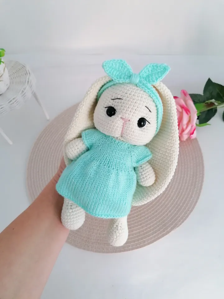 A crocheted bunny in a turquoise dress. a gift for a girl for any occasion