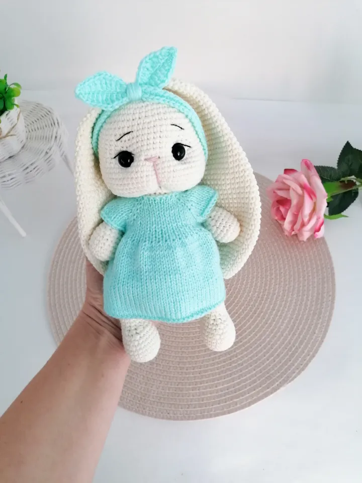 A crocheted bunny in a turquoise dress. a gift for a girl for any occasion