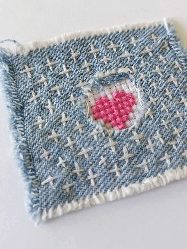 Upcycled denim boro patch. Sashiko stitching.