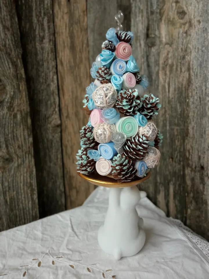 Fabulous handmade Christmas tree on a stand with a teddy bear
Xmas home decor indoor. Christmas ornament