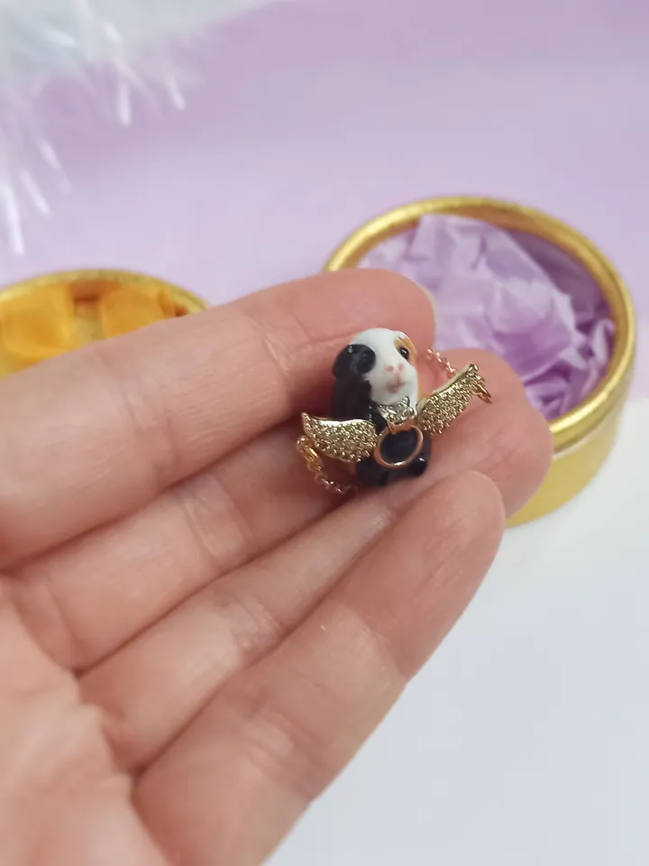Handmade guinea pig pendant, adorned with rhinestones and gold wings (US discount)