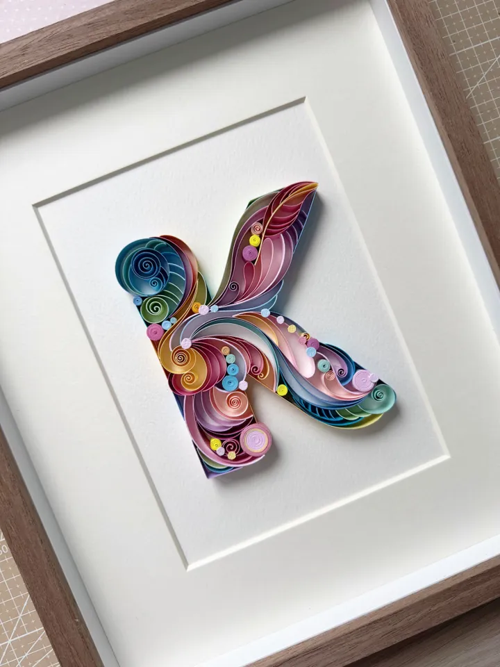 Custom initial in quilling technique