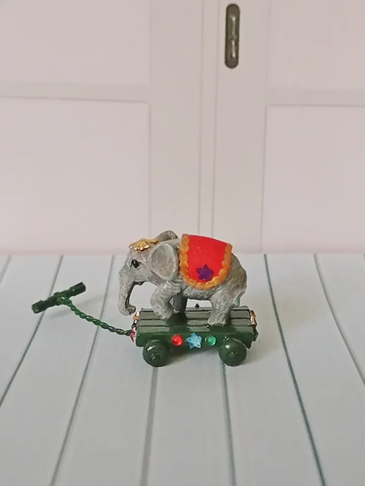 Elephant on a cart. Dollhouse miniature.1:12 scale.