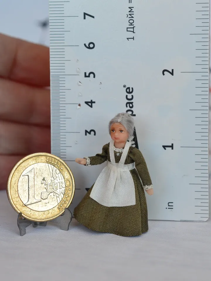 Miniature doll in the 48th scale. Grandmother for a dollhouse.