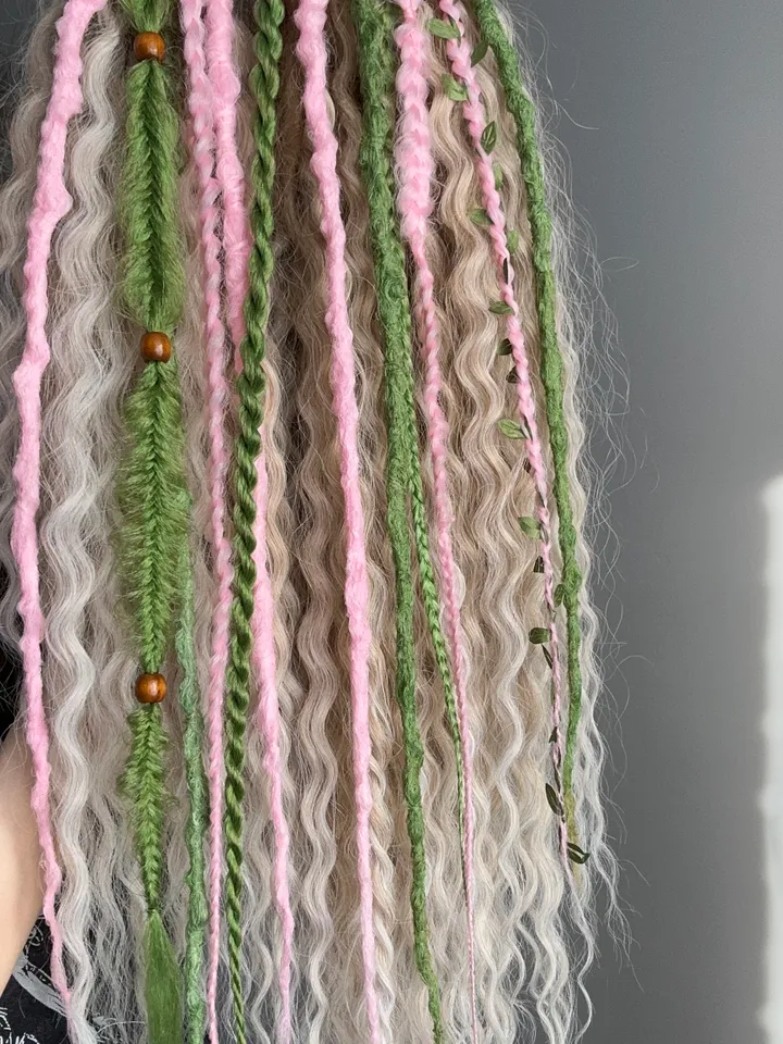 Curly dreads, green dreads, pink braids