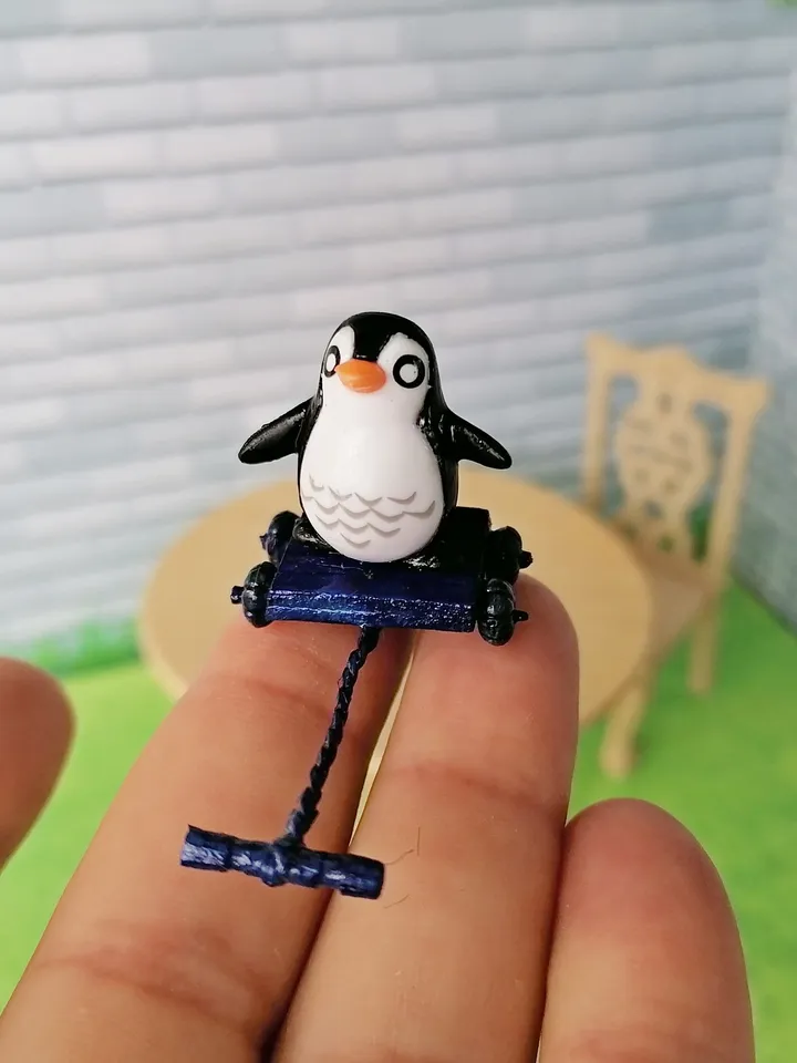 Penguin on a cart. Doll miniature.1:12.