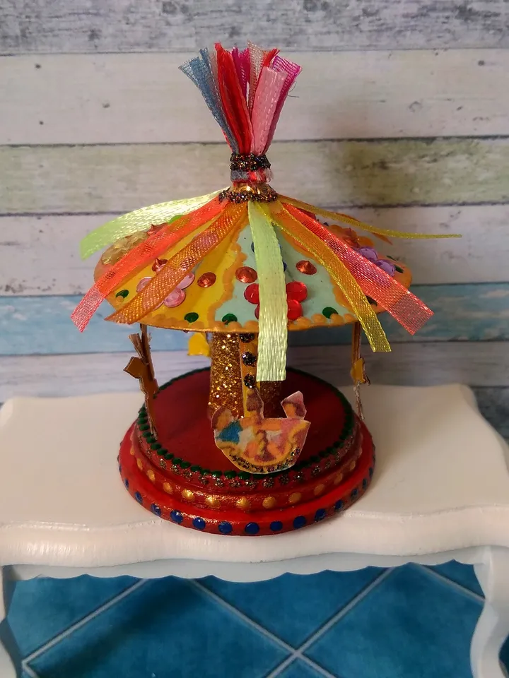 Miniature carousel. Dollhouse miniature.1:12 scale.