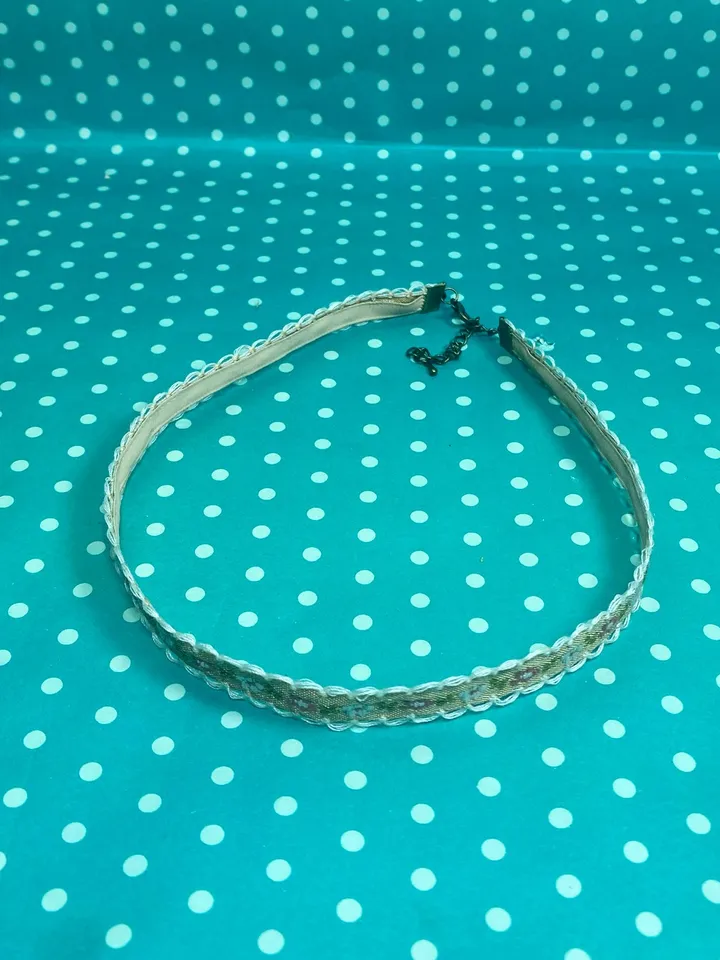 Choker around the neck. Handmade costume jewelry