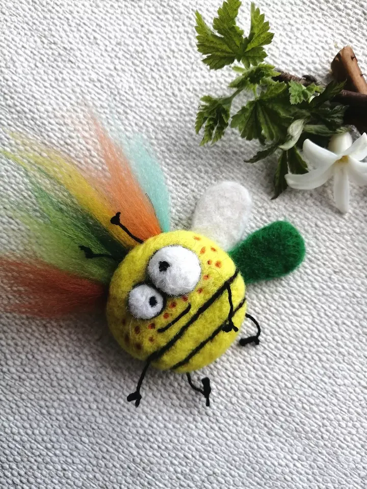Women's original brooch in a handmade gift box. Sunny summer decoration for girls