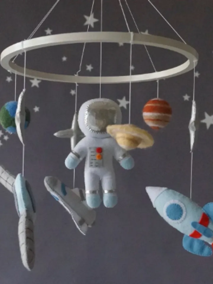 A space baby mobile. Spaceship and planets for boy's nursery decor,  outer space orbit handmade mobile