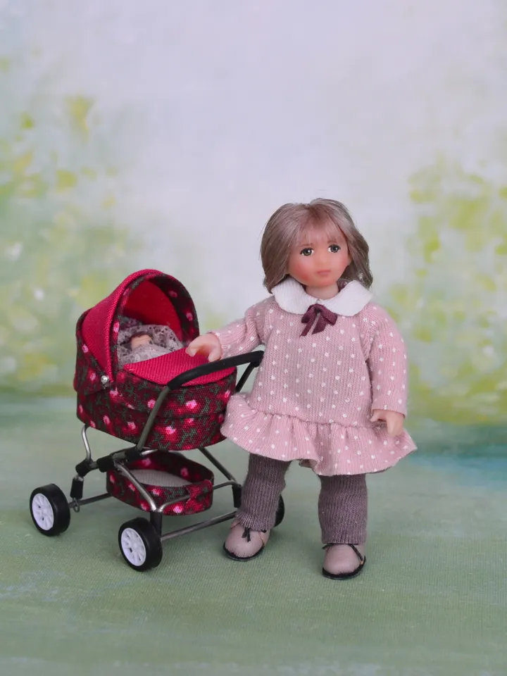 Miniature doll child in 12th scales
