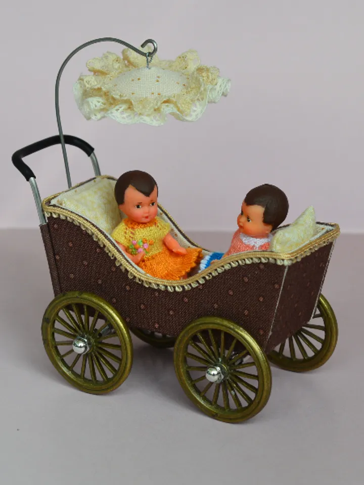 Miniature toy stroller for two small dolls. Handmade miniature stroller for small dolls.