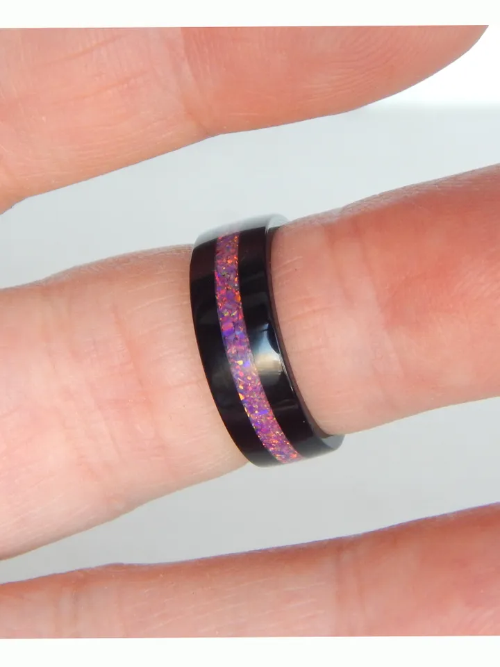 Stylish black ring. Carbon ring with synthetic opal. 7