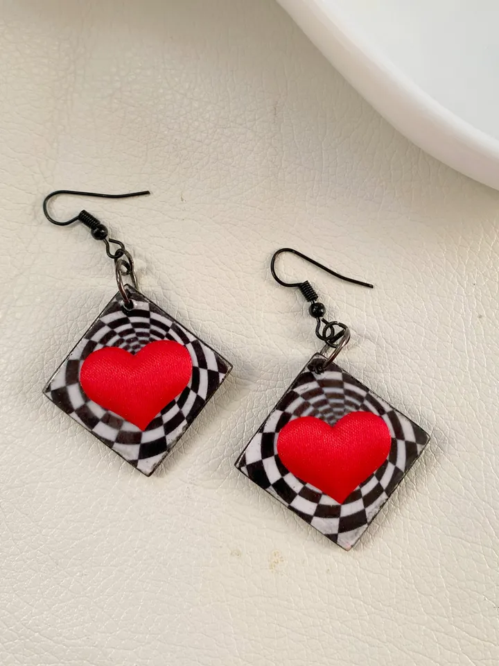 Bright handmade earrings. Handmade jewelry. Author's design. Earrings with bright hearts.