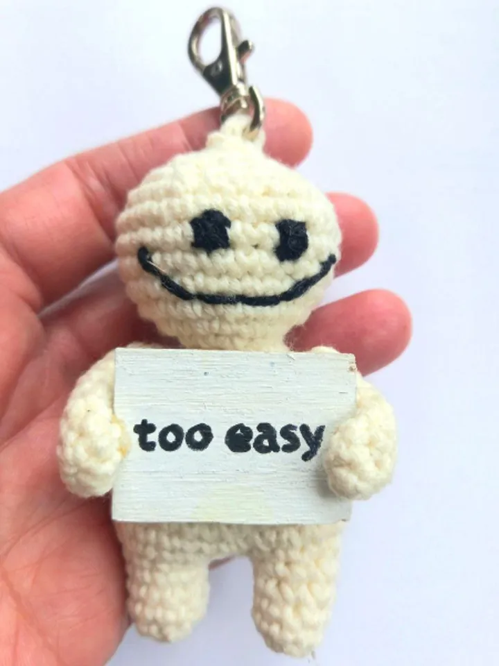 The keychain "too easy" for a bag or keys, a toy in the car interior, a pendant for the rearview mirror
