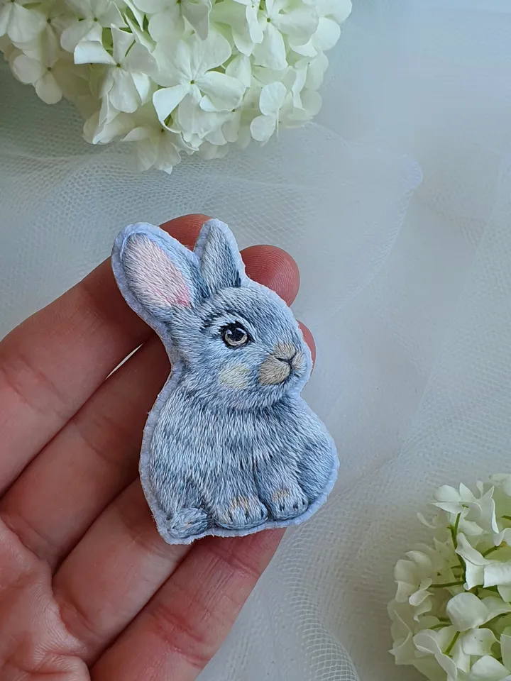Tiny Bunny Brooch. An embroidered brooch in artistic satin stitch.