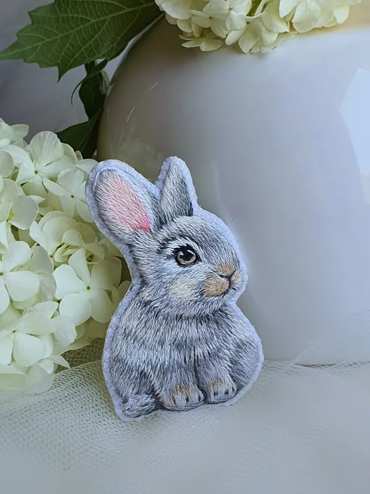 Tiny Bunny Brooch. An embroidered brooch in artistic satin stitch.