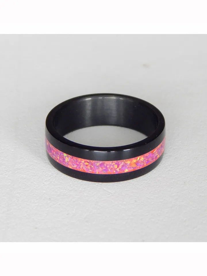 Stylish black ring. Carbon ring with synthetic opal. 8