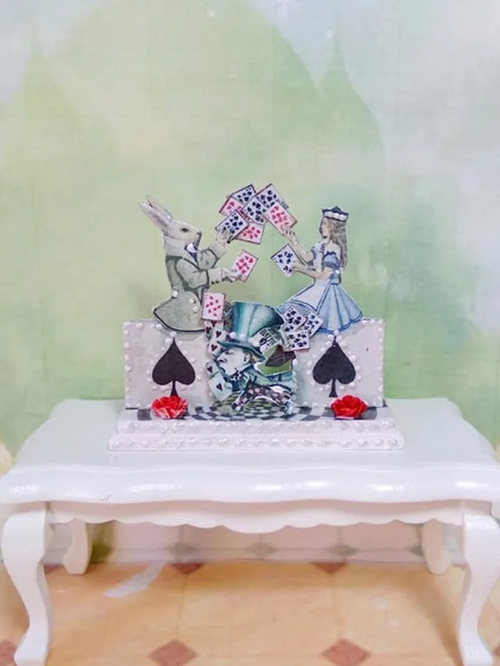 Miniature puppet theater in the style of Alice.Dollhouse miniature.