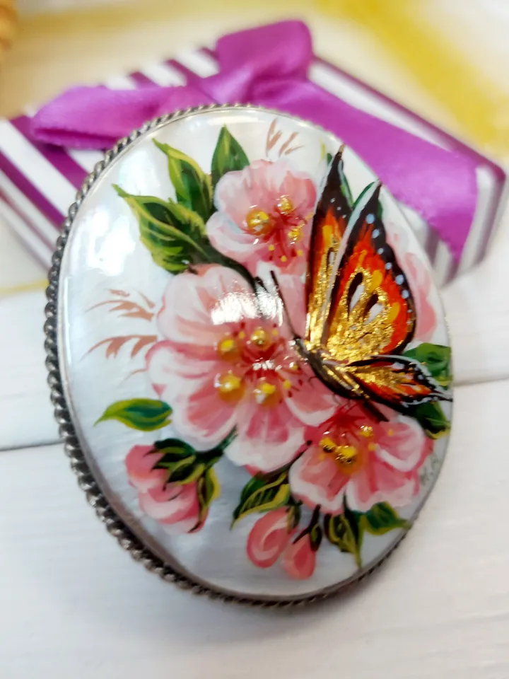 Brooches for women: A delicate butterfly on wild rose blossoms mother of pearl pin, hand painted pink floral brooch made from shell