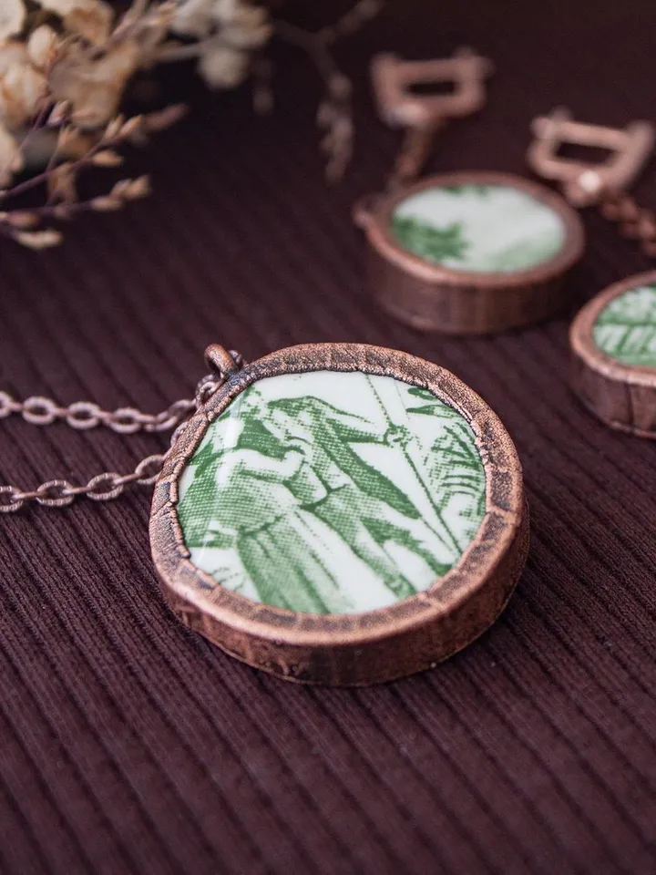 Unique handmade porcelain pendant in a copper frame made using the electroforming process